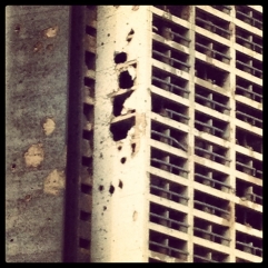 Traces of heavy shelling at the SODECO building